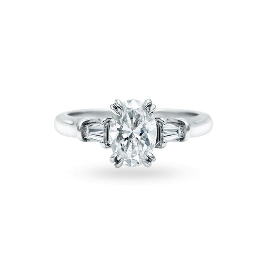 Classic Oval-Shaped Engagement Ring with Tapered Baguette Side Stones